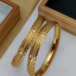 Stunning gold-toned bangles with a bold leaf motif design