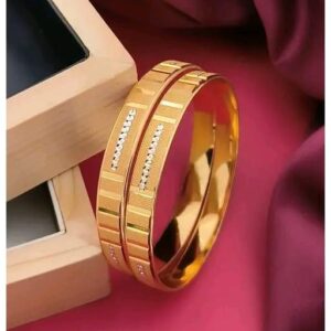 Elegant gold-toned bangles with a sleek, modern design