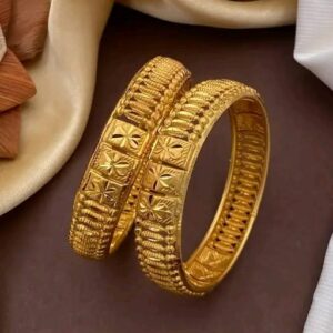 Elegant gold-toned bangles with a sleek, modern design