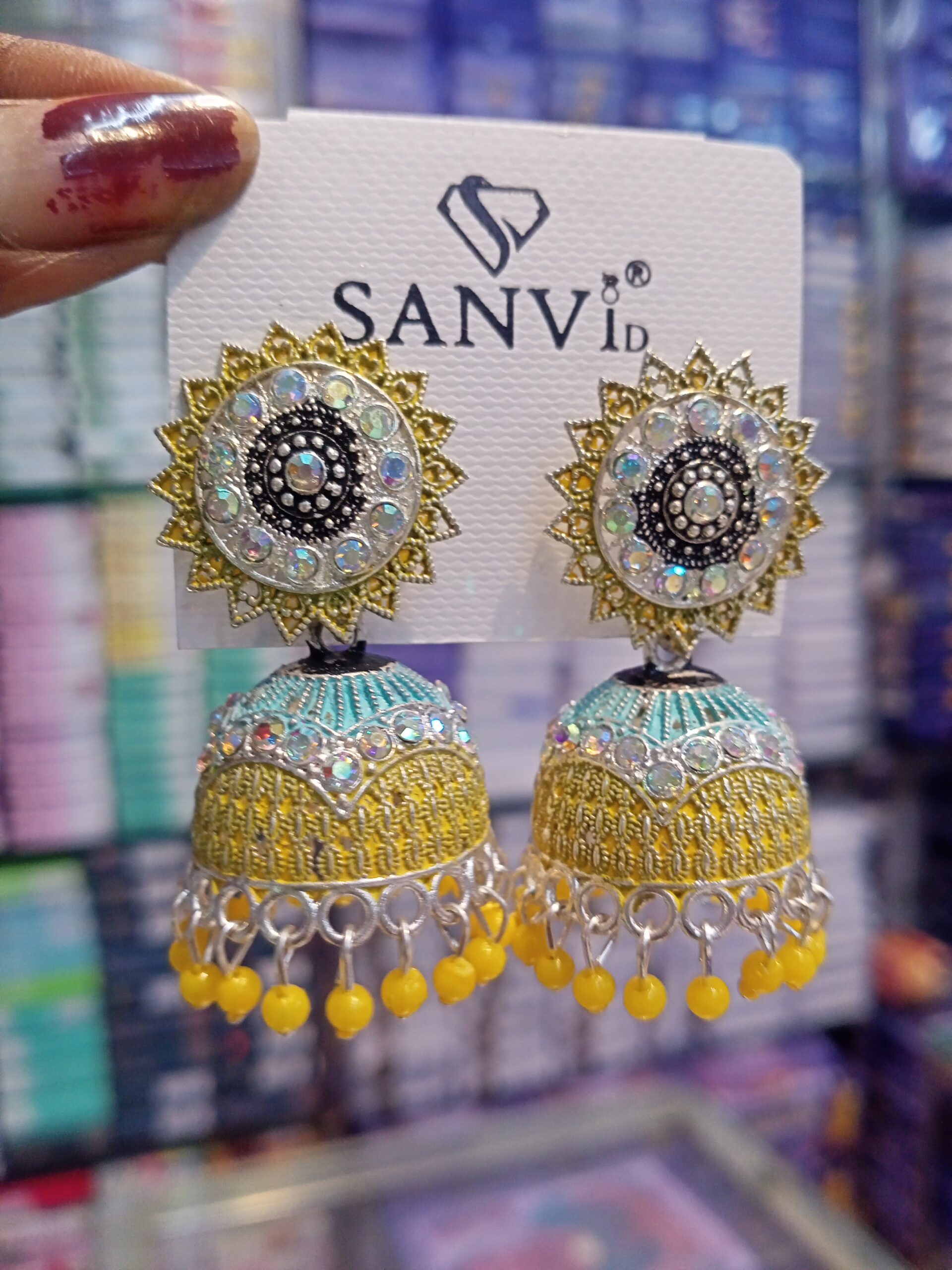 AD stone jhumka Earrings